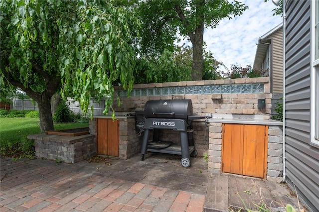 6919 Rockingham Dr SW, Cedar Rapids, IA 52404 - view of patio / terrace with a grill