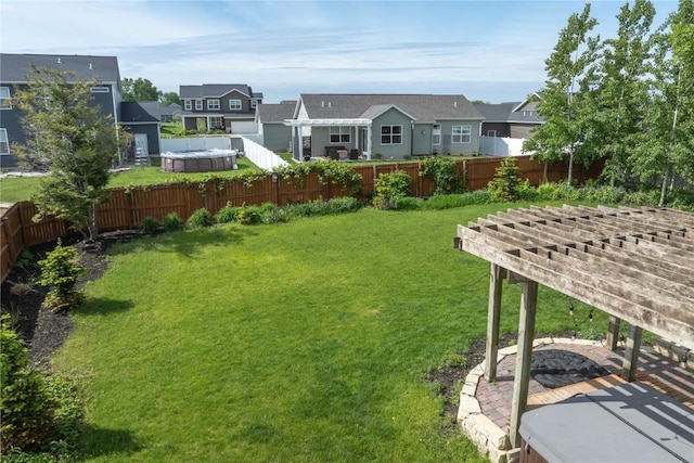 6919 Rockingham Dr SW, Cedar Rapids, IA 52404 - view of yard with a pergola and a residential view