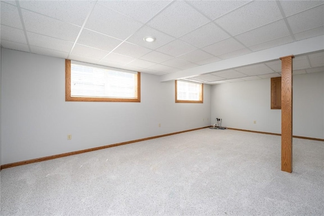 6919 Rockingham Dr SW, Cedar Rapids, IA 52404 - below grade area with a drop ceiling, carpet, and baseboards