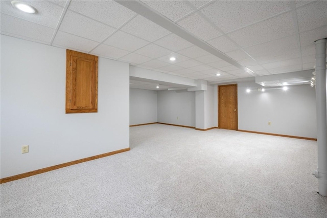 6919 Rockingham Dr SW, Cedar Rapids, IA 52404 - finished below grade area featuring light colored carpet, a drop ceiling, baseboards, and recessed lighting