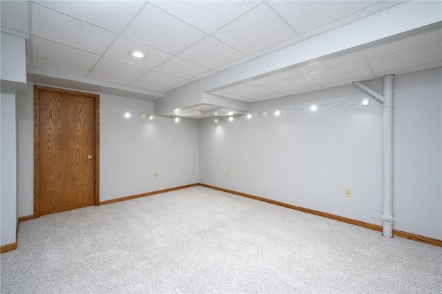 6919 Rockingham Dr SW, Cedar Rapids, IA 52404 - finished below grade area featuring light carpet, baseboards, and a drop ceiling