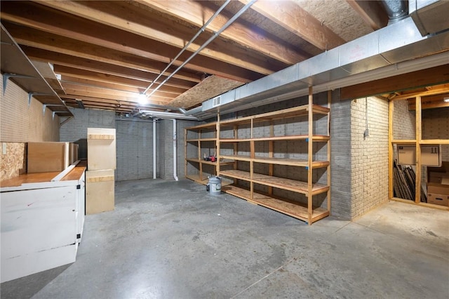 6919 Rockingham Dr SW, Cedar Rapids, IA 52404 - unfinished basement featuring brick wall