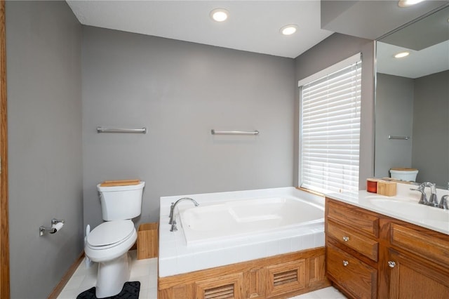 6919 Rockingham Dr SW, Cedar Rapids, IA 52404 - full bath with toilet, healthy amount of natural light, a bath, vanity, and recessed lighting