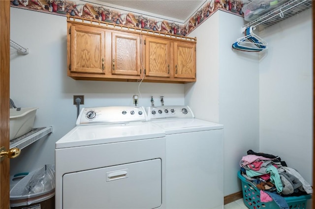 6919 Rockingham Dr SW, Cedar Rapids, IA 52404 - laundry area featuring washer and clothes dryer and cabinet space