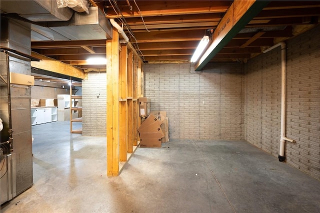 6919 Rockingham Dr SW, Cedar Rapids, IA 52404 - unfinished below grade area featuring brick wall