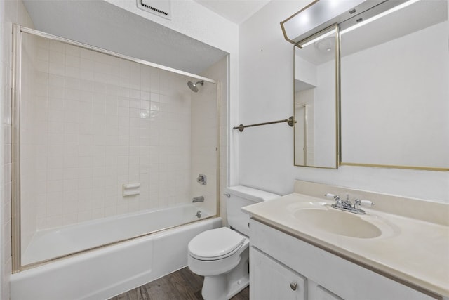 5712 Golden Ct NE Unit 60, Cedar Rapids, IA 52402 - bathroom with vanity, wood finished floors, toilet, and washtub / shower combination