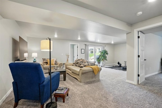 927 Summit Ct, Tiffin, IA 52340 - living room featuring carpet, baseboards, and recessed lighting