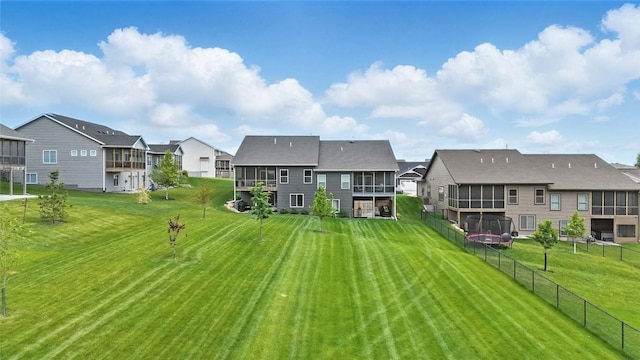 927 Summit Ct, Tiffin, IA 52340 - rear view of property with a residential view and a sunroom