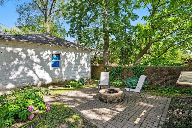 715 E Market St, Iowa City, IA 52245 - view of patio with an outdoor fire pit