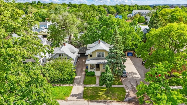 715 E Market St, Iowa City, IA 52245 - view of subject property with a tree filled landscape