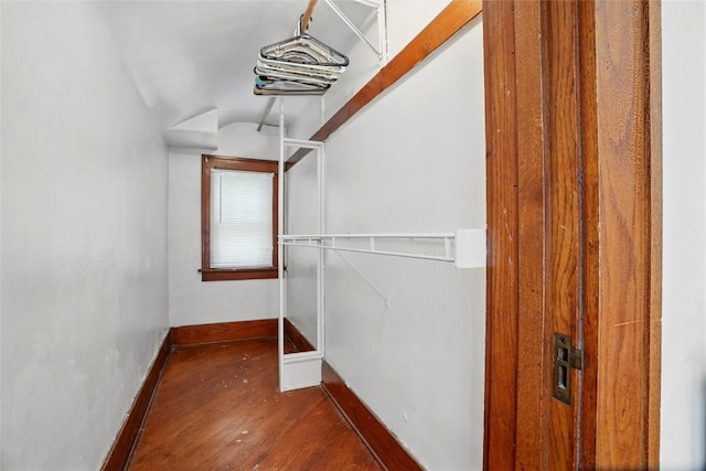 715 E Market St, Iowa City, IA 52245 - walk in closet with wood finished floors and lofted ceiling