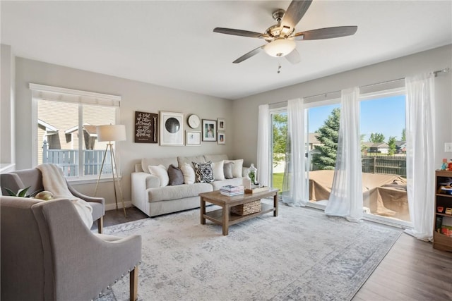 5150 Prairie Ridge Dr, Marion, IA 52302 - living area with ceiling fan and wood finished floors