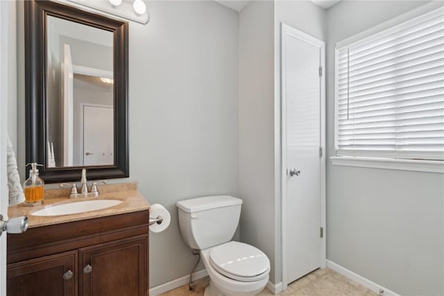 5150 Prairie Ridge Dr, Marion, IA 52302 - half bath featuring toilet, vanity, and baseboards