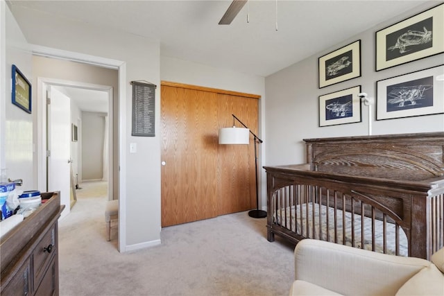 5150 Prairie Ridge Dr, Marion, IA 52302 - bedroom with light carpet, baseboards, a ceiling fan, and a closet