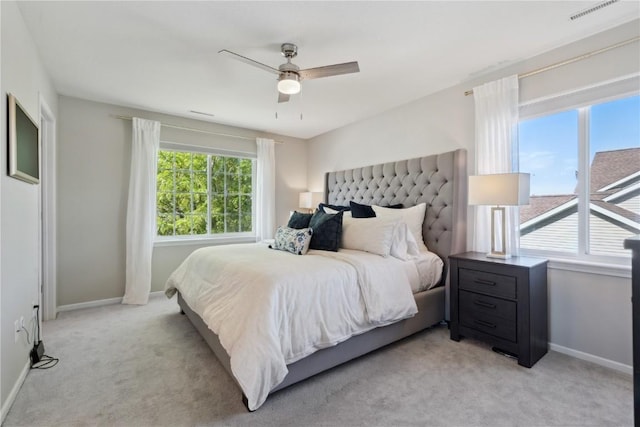 5150 Prairie Ridge Dr, Marion, IA 52302 - bedroom featuring light colored carpet, baseboards, and ceiling fan