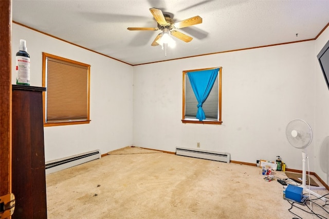 113 Chaffee Dr, Hiawatha, IA 52233 - carpeted spare room featuring a baseboard radiator, crown molding, a ceiling fan, and baseboards