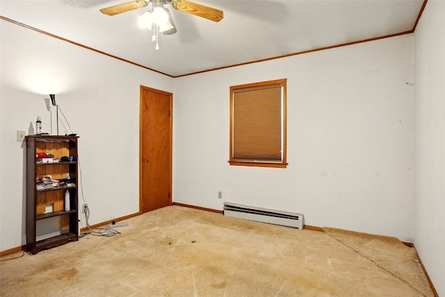 113 Chaffee Dr, Hiawatha, IA 52233 - empty room with baseboard heating, carpet, a ceiling fan, crown molding, and baseboards