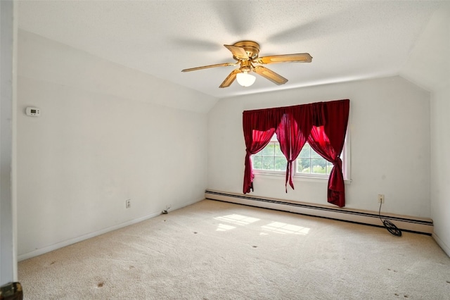 113 Chaffee Dr, Hiawatha, IA 52233 - additional living space featuring a baseboard radiator, vaulted ceiling, carpet flooring, a ceiling fan, and baseboards