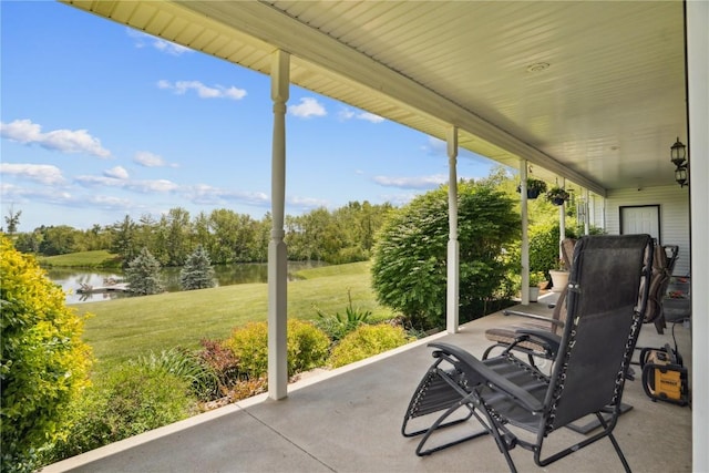 2545 F52 Trl, Parnell, IA 52325 - view of patio with a water view and view of wooded area