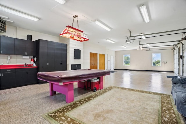 2545 F52 Trl, Parnell, IA 52325 - game room with billiards table, bar area, dark aggregate flooring, and baseboards
