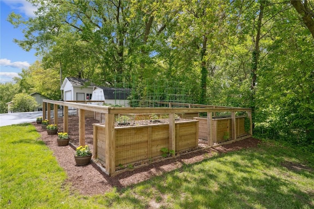 2545 F52 Trl, Parnell, IA 52325 - view of grassy yard with a garden and an outdoor structure