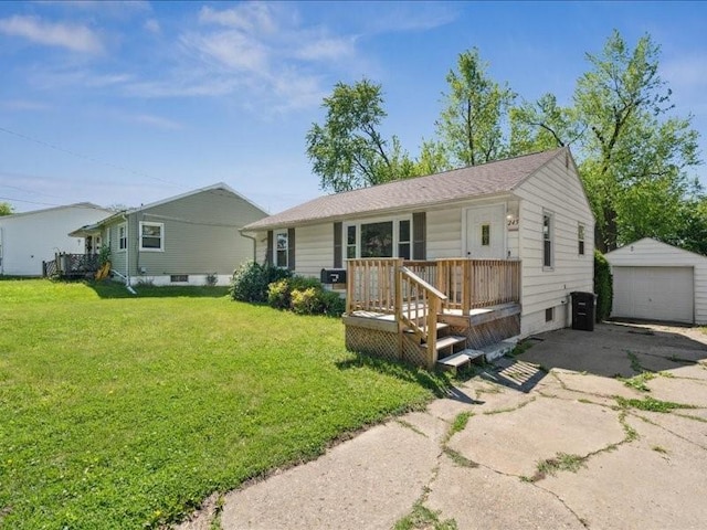 245 5th Ave, Marion, IA 52302 - view of front of home featuring a front lawn, an outbuilding, a garage, and driveway