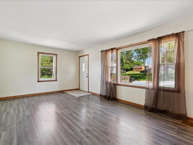 245 5th Ave, Marion, IA 52302 - empty room featuring wood finished floors and baseboards