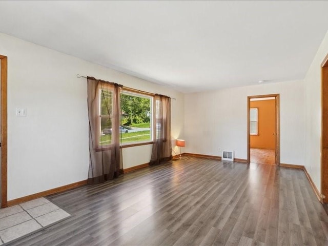 245 5th Ave, Marion, IA 52302 - empty room with wood finished floors and baseboards
