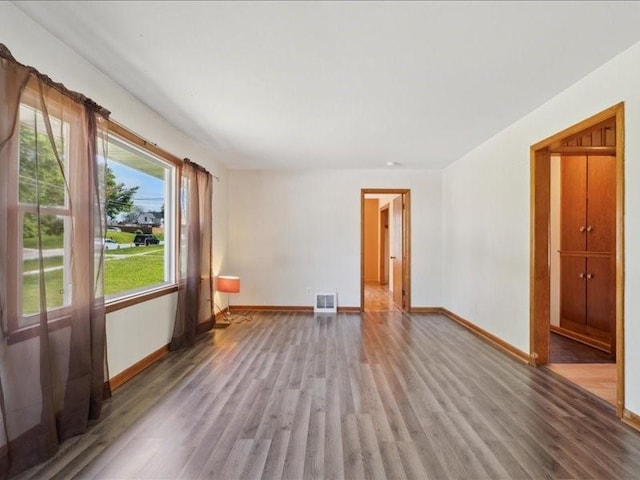245 5th Ave, Marion, IA 52302 - unfurnished room featuring wood finished floors and baseboards