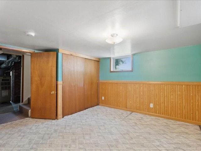 245 5th Ave, Marion, IA 52302 - basement featuring a wainscoted wall and wooden walls