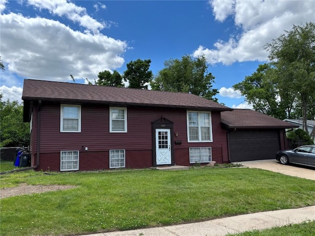 4625 White Pine Dr NE, Cedar Rapids, IA 52402 - bi-level home with an attached garage and concrete driveway