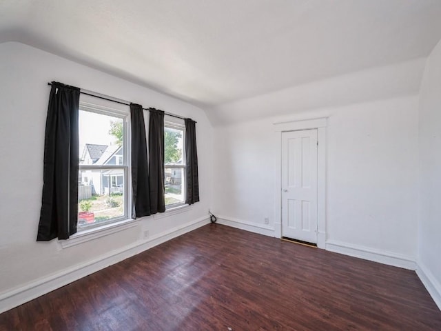 280 14th Ave SW, Cedar Rapids, IA 52404 - unfurnished room with lofted ceiling, wood finished floors, and baseboards