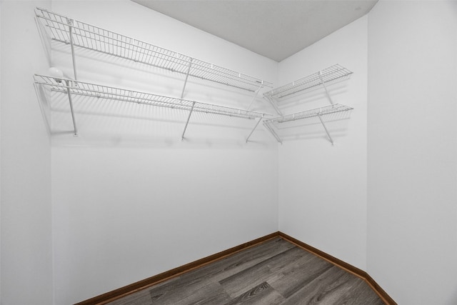 2536 N Ave NW, Cedar Rapids, IA 52405 - spacious closet with dark wood-style flooring