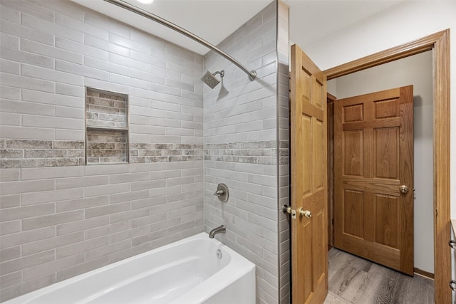 2536 N Ave NW, Cedar Rapids, IA 52405 - full bath featuring  shower combination and wood finished floors