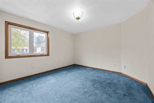 2536 N Ave NW, Cedar Rapids, IA 52405 - unfurnished room featuring carpet flooring and baseboards