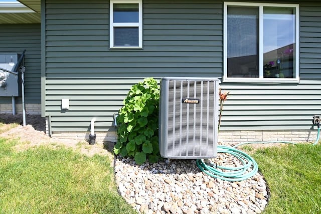 3902 Bluebird Dr SW, Cedar Rapids, IA 52404 - exterior view of central air condition unit