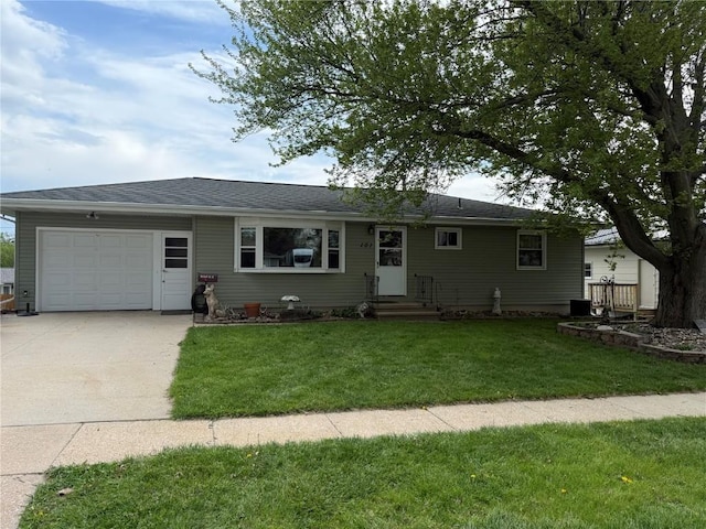 101 26th Avenue Dr SW, Cedar Rapids, IA 52404 - single story home with a garage, concrete driveway, a front yard, and entry steps