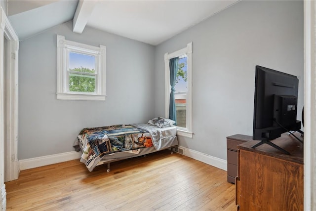 311 3rd St S, Coggon, IA 52218 - bedroom featuring light wood-type flooring and baseboards
