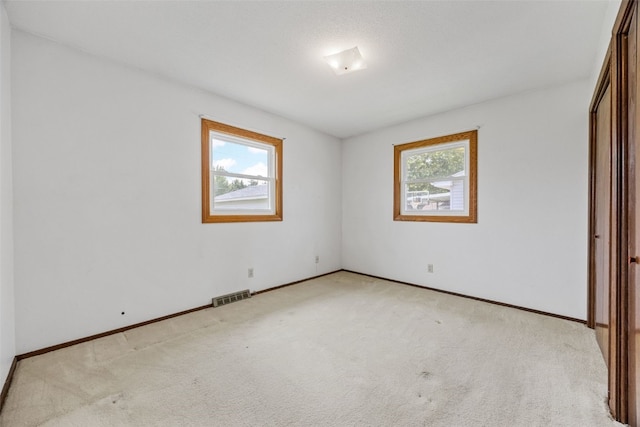 1083 Rainbow Blvd, Hiawatha, IA 52233 - unfurnished bedroom with carpet and baseboards