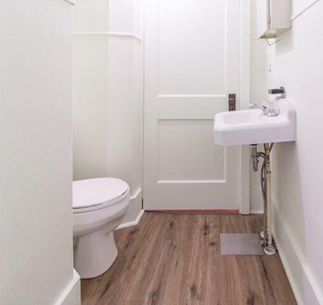 731-733 5th Ave, Marion, IA 52302 - bathroom with wood finished floors and toilet