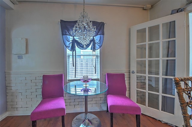 361 30th St SE, Cedar Rapids, IA 52403 - dining room with a chandelier and wood finished floors