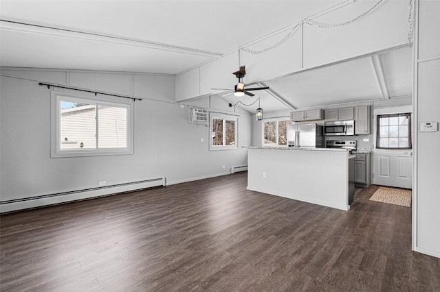 840 S Dubuque St, Solon, IA 52333 - kitchen with appliances with stainless steel finishes, gray cabinetry, ceiling fan, dark wood finished floors, and a baseboard radiator