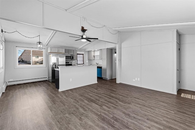 840 S Dubuque St, Solon, IA 52333 - kitchen featuring stainless steel appliances, baseboard heating, and dark wood-style floors