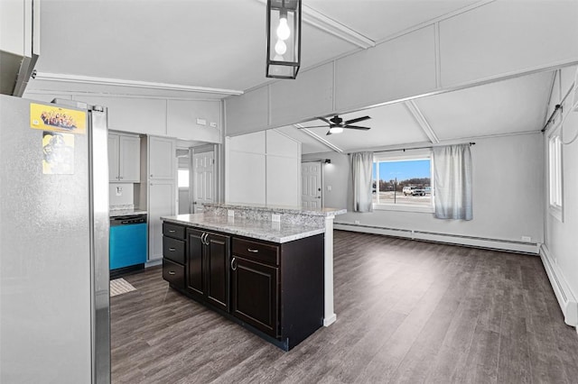840 S Dubuque St, Solon, IA 52333 - kitchen with freestanding refrigerator, a baseboard heating unit, dark wood-type flooring, dishwasher, and a kitchen island