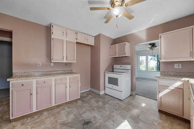 87 14th Ave SW, Cedar Rapids, IA 52404 - kitchen with white range with electric stovetop, ceiling fan, light countertops, a textured ceiling, and light flooring