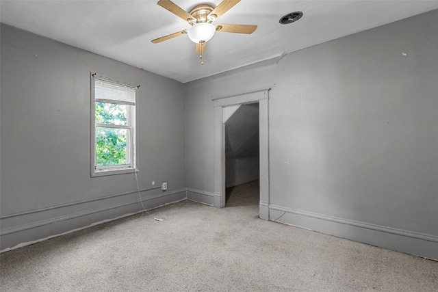 87 14th Ave SW, Cedar Rapids, IA 52404 - unfurnished room with carpet floors, baseboards, and a ceiling fan