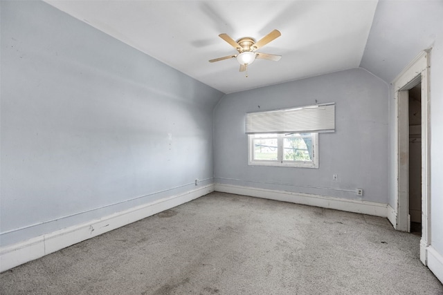 87 14th Ave SW, Cedar Rapids, IA 52404 - carpeted spare room with lofted ceiling and ceiling fan