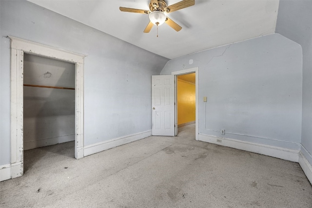 87 14th Ave SW, Cedar Rapids, IA 52404 - unfurnished bedroom with baseboards, vaulted ceiling, ceiling fan, and a closet