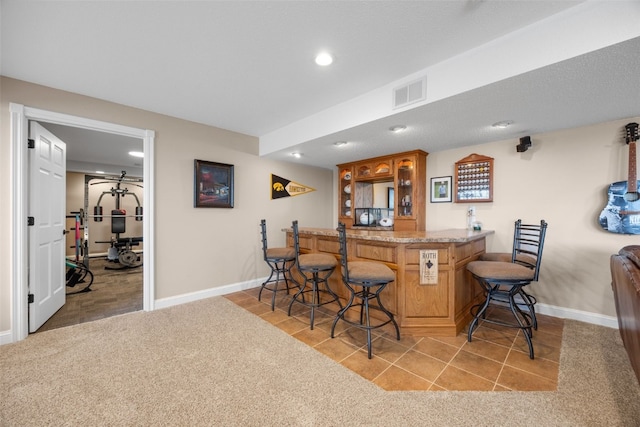 2545 Silver Oak Trl, Marion, IA 52302 - indoor bar featuring recessed lighting, baseboards, and light carpet