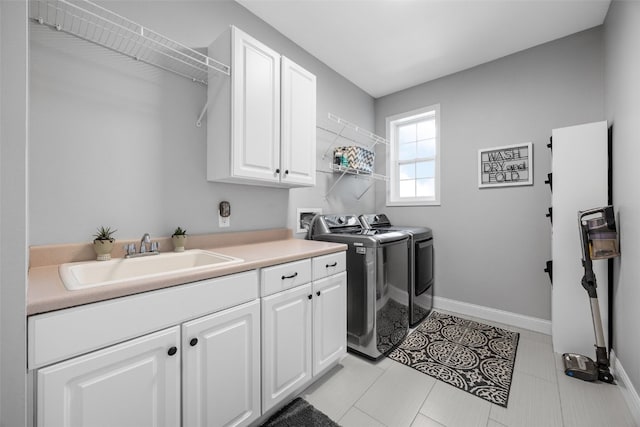 2545 Silver Oak Trl, Marion, IA 52302 - laundry area with independent washer and dryer, cabinet space, and baseboards